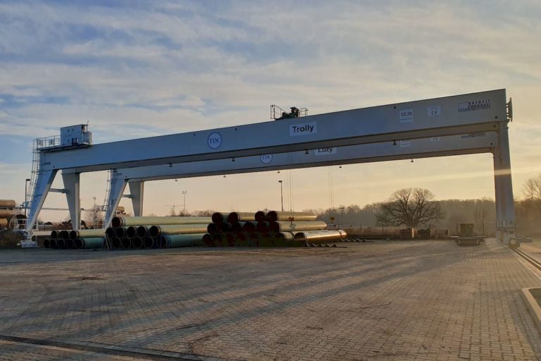 Trolly and Luzy cranes with pipes below in TDC's factory in Germany