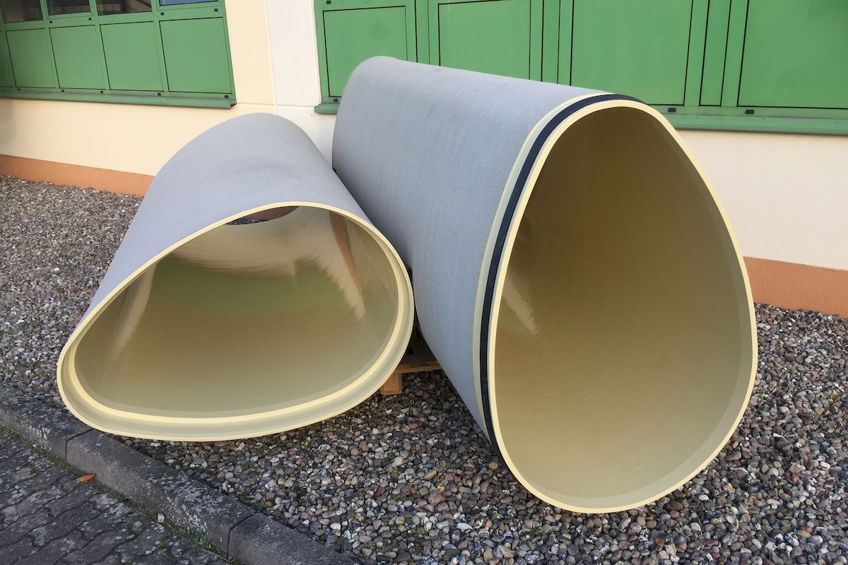 Two engineered custom-made non-ciruclar pau line GRP pipes for wastewater